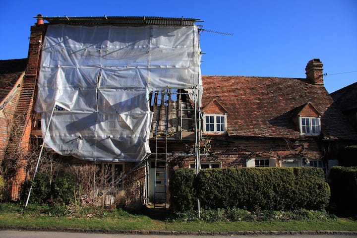 Fire damage effects part of the structure of this brick Champaign home.